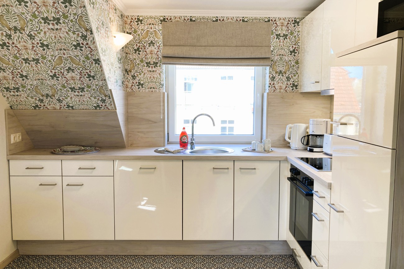 Apartmenthaus Meergold in Saßnitz auf der Insel Rügen - zentral und hafennah gelegen - mit Parkplatz, mit Motorradgarage, mit Fahrradraum am Haus - 2-Raum-Ferienwohnung Morgen am Meer - für 1, 2 oder 3 Personen geeignet